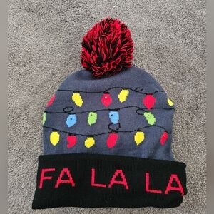 Fa la la fleece pom pom light up beanie